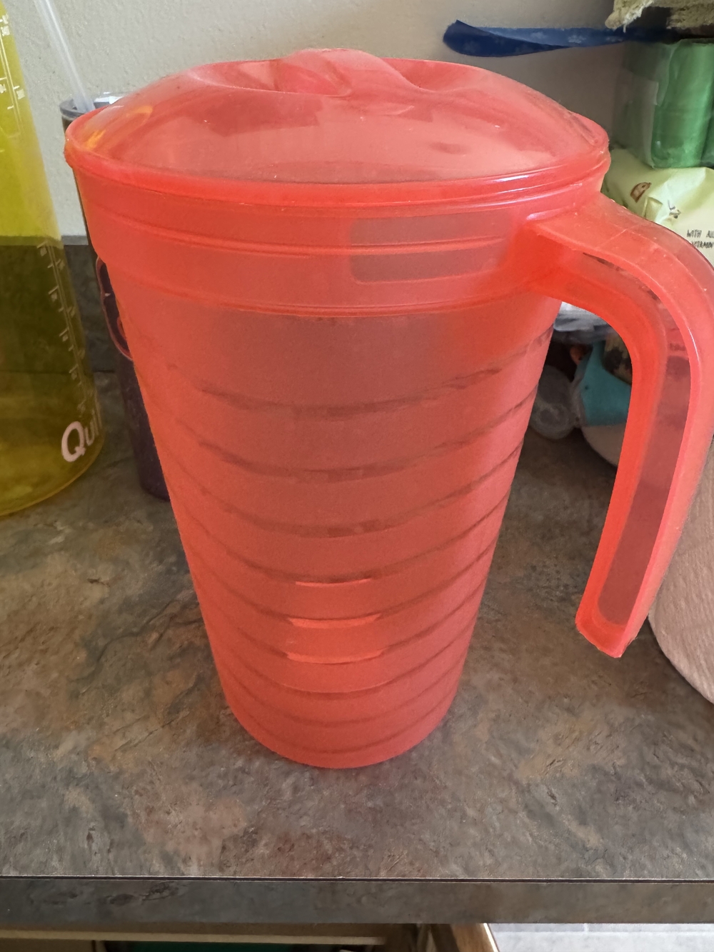Stackable Red Plastic Pitcher with Lid and Handle